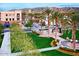 Upscale town square with shops and palm trees at 3440 N Boulder Ct, Buckeye, AZ 85396