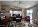 Living room features western decor and sliding glass door at 650 N Hawes Rd # 5108, Mesa, AZ 85207