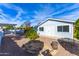 Backyard view, detached building, gravel at 6819 E Grandview Dr, Scottsdale, AZ 85254