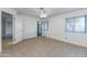 Bright bedroom with tile flooring and ceiling fan at 6819 E Grandview Dr, Scottsdale, AZ 85254
