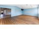 Bright bonus room with wood-look floors and access to backyard at 6819 E Grandview Dr, Scottsdale, AZ 85254