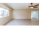 Living room with tile floors and access to other rooms at 6819 E Grandview Dr, Scottsdale, AZ 85254