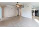 Living room with tile floors and kitchen view at 6819 E Grandview Dr, Scottsdale, AZ 85254