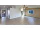 Bright living room with tile floors and ceiling fan at 6819 E Grandview Dr, Scottsdale, AZ 85254
