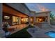 Spacious backyard patio with pool, built-in BBQ, and comfortable seating at 9325 E Paraiso Dr, Scottsdale, AZ 85255