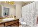 Clean bathroom with granite vanity and updated fixtures at 9325 E Paraiso Dr, Scottsdale, AZ 85255