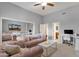 Well-lit bedroom with a cozy sofa and large windows at 9325 E Paraiso Dr, Scottsdale, AZ 85255