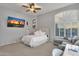 Bright bedroom with a queen-size bed and plenty of natural light at 9325 E Paraiso Dr, Scottsdale, AZ 85255