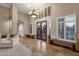 Elegant entryway with double doors, high ceilings, and chandelier at 9325 E Paraiso Dr, Scottsdale, AZ 85255