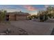 Home with a large garage and a spacious brick driveway at 9325 E Paraiso Dr, Scottsdale, AZ 85255
