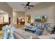 Open living area with sectional sofa and view into kitchen at 9325 E Paraiso Dr, Scottsdale, AZ 85255