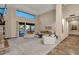Spacious living area with seating and views of the pool at 9325 E Paraiso Dr, Scottsdale, AZ 85255