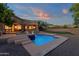 Relaxing backyard featuring a rectangular pool and spa with a waterfall feature at 9325 E Paraiso Dr, Scottsdale, AZ 85255