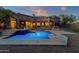 Expansive backyard oasis with a sparkling pool, spa, and spacious patio at 9325 E Paraiso Dr, Scottsdale, AZ 85255
