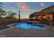 Inviting pool and spa with waterfall feature, enhancing outdoor living at 9325 E Paraiso Dr, Scottsdale, AZ 85255