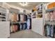 Large walk-in closet with ample shelving and hanging space at 9325 E Paraiso Dr, Scottsdale, AZ 85255