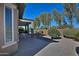 Spacious backyard with mature trees and a sitting area at 7132 W Trenton Way, Florence, AZ 85132