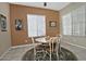 Cozy breakfast nook with a round table and four chairs at 7132 W Trenton Way, Florence, AZ 85132