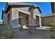 Front porch with seating area and stone accents at 7132 W Trenton Way, Florence, AZ 85132