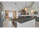 Modern kitchen with granite countertops and stainless steel appliances at 7132 W Trenton Way, Florence, AZ 85132