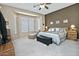 Large main bedroom with bay window and sitting area at 7132 W Trenton Way, Florence, AZ 85132