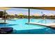 Resort-style pool with shade structures at 7132 W Trenton Way, Florence, AZ 85132