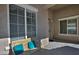 Covered porch with a bench, offering a relaxing outdoor space at 7132 W Trenton Way, Florence, AZ 85132