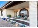 Covered porch with seating area, perfect for relaxing outdoors at 8039 E Madero Ave, Mesa, AZ 85209