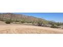 Empty desert lot with mountains and desert plants at 0000 W Hooper Trl # 2, Queen Creek, AZ 85144