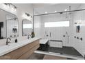 Modern bathroom with double vanity and a large walk-in shower at 0 N Bell Rd # 4, Queen Creek, AZ 85144