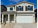 Two-story home with front porch and two-car garage at 651 S Del Rancho Cir, Mesa, AZ 85208