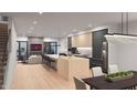 Modern kitchen with large island, stainless steel appliances, and open layout at 6932 E 1St St, Scottsdale, AZ 85251
