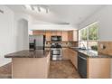 Kitchen with granite countertops and stainless steel appliances at 3329 E Long Lake Rd, Phoenix, AZ 85048