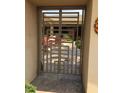 Elegant gated entry to a private backyard patio at 10100 N 78Th Pl, Scottsdale, AZ 85258