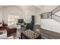 Spacious living room with foosball table and high ceilings at 7233 W Corrine Dr, Peoria, AZ 85381