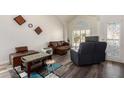 Living room with a foosball table and comfortable seating at 7233 W Corrine Dr, Peoria, AZ 85381
