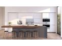 Modern kitchen with island and stainless steel appliances at 4575 N Phoenician Blvd # 3, Scottsdale, AZ 85251