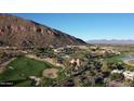 Resort community aerial view with mountain backdrop at 4575 N Phoenician Blvd # 5, Scottsdale, AZ 85251