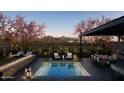 Private backyard oasis with a built-in fire pit and pool at 19355 N 73Rd Way # 5026, Scottsdale, AZ 85255