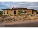 Stunning curb appeal of a modern home with desert landscaping at 8366 E Old Paint Trl, Scottsdale, AZ 85266