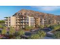 Modern apartment building with landscaping and mountain views at 4849 N Camelback Ridge Rd # B404, Scottsdale, AZ 85251