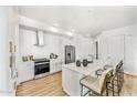 Modern kitchen with white cabinets, stainless steel appliances, and quartz countertops at 3131 N Central Ave # 4015, Phoenix, AZ 85012