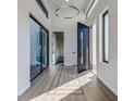 Bright and spacious entryway with modern flooring at 12140 N 106Th St, Scottsdale, AZ 85259