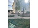 Exterior of building with walkway and landscaping at 3840 N 43 Ave # 50, Phoenix, AZ 85031