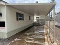 Mobile home with covered patio and walkway at 7300 N 51St Ave # 208, Glendale, AZ 85301