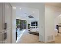 Main bedroom with access to private patio and en-suite bathroom at 41327 N 106Th St, Scottsdale, AZ 85262
