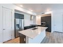 Modern kitchen with stainless steel appliances and an island at 3131 N Central Ave # 5012, Phoenix, AZ 85012