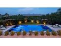 Inviting pool and spa area with mountain views; perfect for outdoor entertaining at 6112 E Quartz Mountain Rd, Paradise Valley, AZ 85253