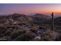 Scenic desert lot with mountain views at sunset at 9108 E Grapevine Pass --, Scottsdale, AZ 85262