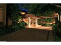 Brick driveway leading to a grand home entrance at 15 Biltmore Estates Dr, Phoenix, AZ 85016